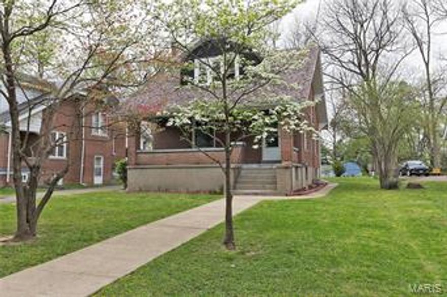 Brick home with great front porch.  Charming older home on tree lined street.  Two bedrooms, two bath with formal dining room.  Roof approximately 5 years old, HVAC approximately 9 years old.  Very nice large backyard.  Seller is providing Home Warranty.