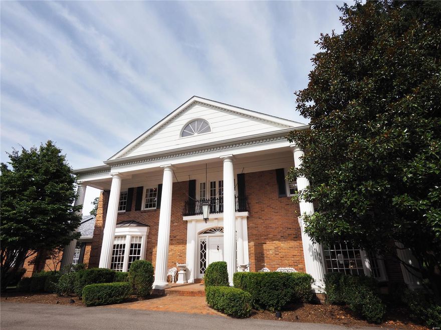 Glamorous Georgian w/wide, classic loggia, dramatic iron lantern & juliet balcony. Private, gated, prof landscaped 3 acre estate w/circle drive & courtyard on one of Ladue's best lanes. Soaring one-of-a-kind cantilevered circle staircase & 5 tiered chandelier welcomes you to marble entry. Step inside an experience of refined living on a large scale. Dramatic light: floor to ceiling windows throughout 1st floor. Bay window alcoves, 5 FP, dark refinished wood, richly paneled family room w/FP, bookcase & fully paneled breakfast room. This home has many unique living spaces: large loft/gathering area at top of stairs & intimate alcove adjacent  to juliet balcony. Expansive Master suite w extensive closets incl walk in closet, master bath w/bidet. Sauna, steam shower. LL has media, billiard, & rec room w/FP & 2nd kitchen. Summer bliss: salt water pool, 3 room pool house, fire pit, tennis ct for family athletes, and 3 wooded acres to explore. 3 car rear entry garage, extra parking.