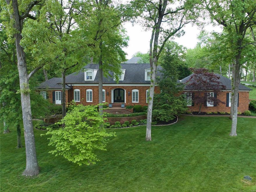 Welcome to a gorgeous Ladue 1.5 story residence on a 1.28 lot with a salt water pool, patio, screened porch and a back yard with space for outdoor activities.  The family room is an inviting gathering space, with a wet bar, gas fireplace and vaulted ceilings. The open layout to the living room and formal dining room enhances the flow of the home. A spacious kitchen features quartz counters, Viking appliances, center island, custom cabinetry, and convenience to laundry room. The main floor master suite offers a retreat-like ambiance, coffered ceilings, two walk closets, jet tub and separate shower. An office on the main level has built-ins, and attached full bath makes it a guest suite. Upstairs are 4 bedrooms with ample closets. Two of the bedrooms have ensuite and two have jack and jill bathrooms. The lower level is finished for entertainment in rec room with fireplace. Large unfinished space for any use, abundant storage and full bath. The three-car garage provides extra storage. Additional Rooms: Mud Room