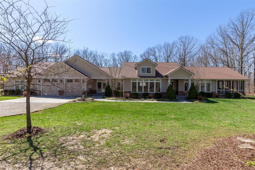 Tucked away and secluded, 401 Kapper Lane is located on 42.5 acres of natural Midwestern beauty with woods, pastures, and a glimmering pond. With five bedrooms, six and a half baths, and numerous indoor and outdoor amenities, this 6,100 square foot Craftsman is truly a hidden gem of the Heartland. Undisturbed and secluded, it offers a welcome retreat from the noise and chaos of the city.  The sprawling grounds and spacious rooms make this property perfect for corporate retreats, family gatherings, or perhaps a couple or family looking to enjoy the austere beauty of the Midwest.  Once inside, you’ll be stunned by the high-ceilings, luxurious amenities, and spacious rooms. Throughout the home, you’ll see well-maintained hickory, pine, ceramic tile, and carpet floors. If you enjoy woodworking, then you’ll be thrilled to know about the woodworking shop. With central heating and cooling, you can work comfortably for hours. Are you ready to call this oasis home?