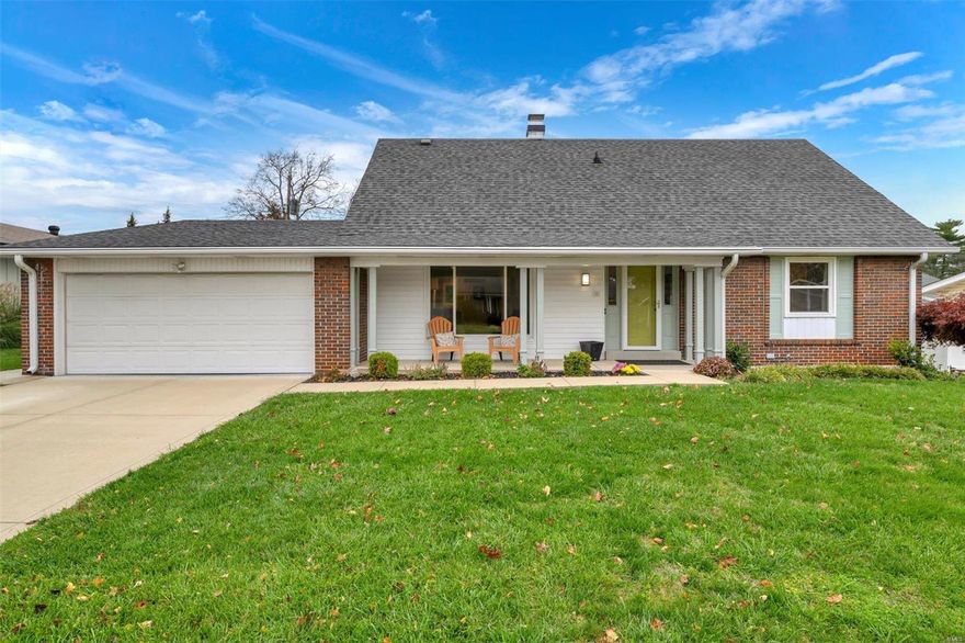 This charming Cape Cod-style 3-bed, 2.5-bath home in Mehlville School District sits on a spacious 0.23-acre lot. The bright living room with wood floors, a ceiling fan, and a cozy wood ceiling flows into the dining room with a decorative fireplace. The updated kitchen features white cabinetry, light stone countertops, a decorative backsplash, and stainless-steel appliances, including a wine cooler. The main floor primary suite has an en suite bath with a marble-finished shower and double vanity. Two additional bedrooms upstairs offer wood-style floors and ceiling fans. The finished lower level includes a recreation room with a dry bar and fireplace. Enjoy outdoor living on the patio and fenced yard with an outdoor dining area and covered porch. This beautifully maintained home is move-in ready!