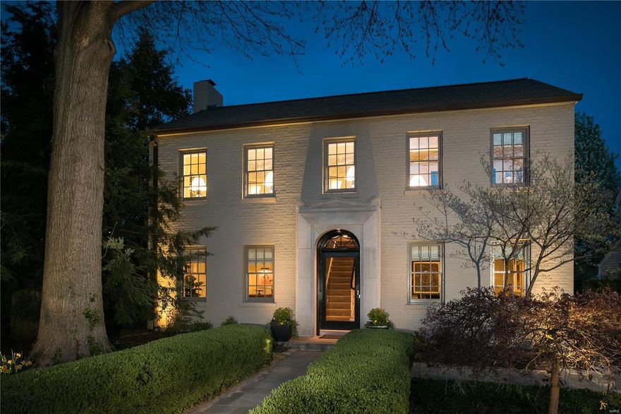 Expanded, updated colonial offers a transitional flair, in Old Town Clayton.  Great condo alternative, with private blue stone terrace, fountain and arbor with flowering vines, offers the perfect spot for entertaining! A wall of windows greats you from the patio, move into the family room with wood burning fireplace and builtin bookcases, including surround sound. The beautifully renovated eat-in kitchen is equipped with top of the line appliances from Wolf, Sub Zero, Fisher Paykel, not to be missed the butler's pantry with wet bar, wine refrigerator and ice maker. The gracious living and dining rooms complete the main level. Upstairs the elegant master suite is complete with a relaxing sitting room, office with built-in desks and en suite bathroom.  Two additional bedrooms share the hall bath.  The lower level rec room has access to a full bath, it is currently being used as an additional bedroom. Close walking distance to Taylor Park. Seller is excluding chandelier in dining room.