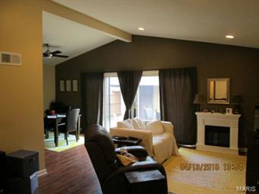 Completely remodeled End Unit Garden Home With 2 Bedrooms and 2 Full Bathrooms. Open concept with vaulted ceiling, Beautiful Kitchen with Granite counter,  Breakfast bar. Newer Flooring, Electric , Furnace, A/C, Water Heater, Newer Drywall throughout, Remodeled Bathrooms(sinks,shower, toilets, lighting). Newer Lighting includes can lights in ceiling. Newer roof and patio. Over sized 2 car garage. Office area could be used as a formal dining room . Large Bedrooms with newer carpet. Main floor laundry. This home is loaded with natural light, has a Private Court Yard and is located near a cal-de-sac . This home is ready to go!!! Note , Electric fireplace does not stay and is not included in sale. Location: End Unit, Ground Level