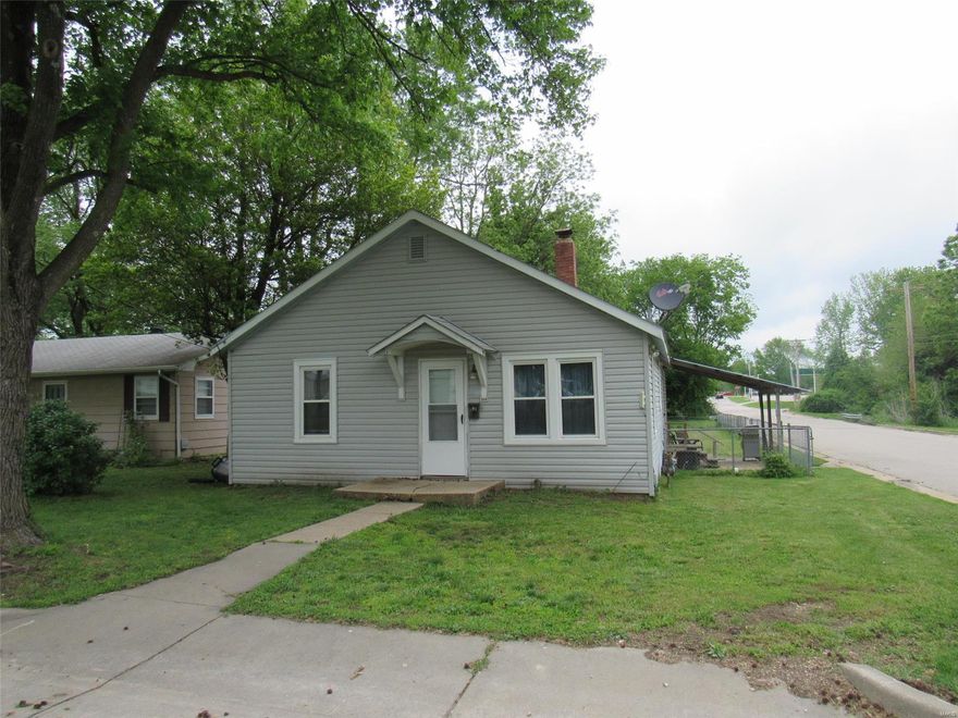 Great starter home, investment property or potential flip. Newer windows and siding in 2014. New bathroom floor installed recently. Good space with 1100 sq ft, 3 bedrooms, and 2 full bathrooms. Large fenced in yard with outbuilding and lean to. Covered patio provides nice space to entertain and bar-b-que. Great location close to stores, post office, restaurants and park. Property is being sold as-is. Additional Rooms: Mud Room