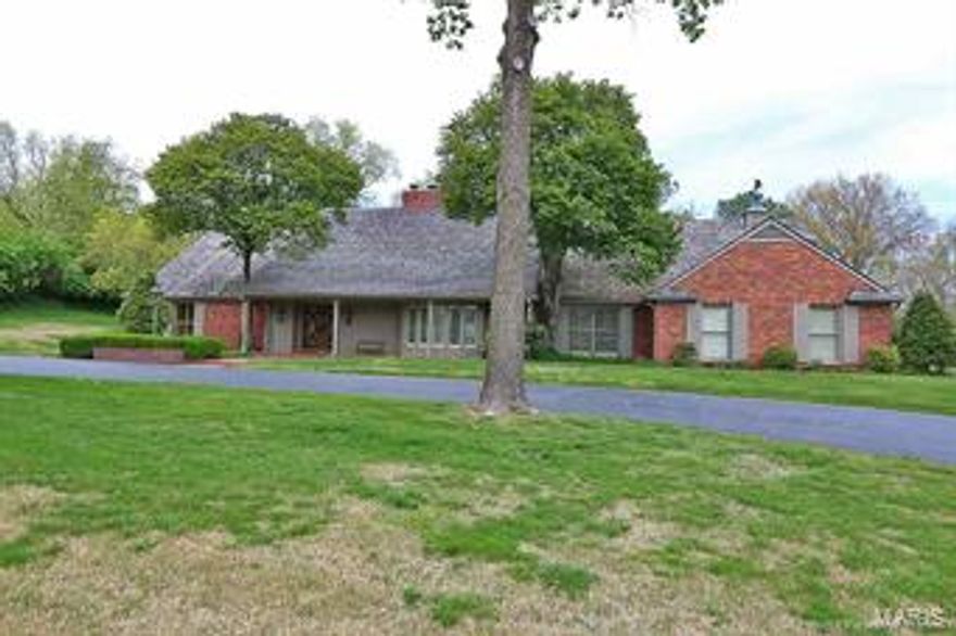 This Home sits in one of the most desirable neighborhoods in Cape Girardeau. It's living at its finest. This home boasts Beauty inside and out. The foyer has a grand staircase with a beautiful chandelier. In every aspect of this home the homeowner paid particular attention to detail. The open floor plan is conducive for entertaining large groups of people. It also was specifically designed for family living. It's large fireplace brings warmth to the informal family living area. The master suite is on the main level. Included in the master suite is a beautiful reading area and expansive adjoining bathroom. The kitchen is large and designed for people who love cooking. Off the kitchen is a sunroom or second dining area. This home truly is a masterpiece in design!! The finishes from top to bottom are exquisite!!!!