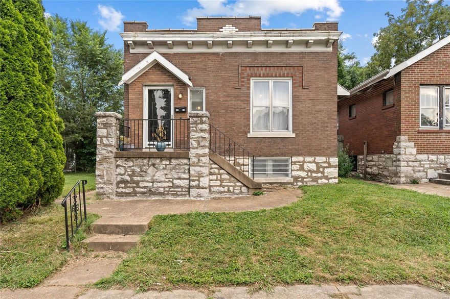 **OPEN HOUSE SATURDAY April 19th, noon - 2 p.m. ** Adorable South St. Louis brick bungalow with a brand new roof on a double lot! This Carondelet cutie features a handsome stone front porch with three spacious bedrooms & one bath and seamlessly blends classic charm & modern updates. Step into a spacious living room w/ hardwood floors & vintage fireplace mantel for added character. Flow through the dining room into the bright eat-in kitchen, perfect for family meals & gatherings. Two of the sizable bedrooms boast durable LVP flooring, while the third has real hardwoods. The bathroom retains its vintage appeal w/ classic fixtures. A detached 2-car garage provides ample storage & workspace. The fenced in backyard and patio is a nice space to retreat. Washer and Dryer stay in the roomy lower level with addt'l finished space & storage options. Located in a quiet neighborhood close to schools, parks, shopping and restaurants; just 10 ten minutes from downtown St. Louis.