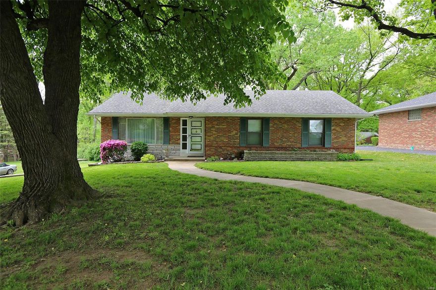 One of a kind custom built ranch style home located in a quaint parklike neighborhood. Full brick exterior with aluminum soffit, architectural roof and vinyl replacement windows. The oversized double driveway lined with perennials that leads to the side entry garage is both practical and beautiful. One of the many highlights of this home is the redwood multi-level deck it is ideal for entertaining or relaxing. This home is loaded with architectural detail such as crown molding, Pella sliding glass door and pocket doors. Basement is partially finished with workshop, storage, full bath and family room. The interior has been freshly painted with new flooring, the furnace and a/c were replaced in 2014.