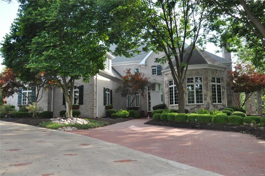 Sophisticated 1.5 story home tucked away on a cul-de-sac located in a distinguished Frontenac subdivision. Be wowed upon entry when you notice the 2-story 20 ft tall ceilings throughout the entry foyer, great room and dining room. 4 large bedrooms w/ensuites- 6 bathrooms total throughout. The basement is ready for entertainment with climate control wine cellar, tasting room, bar, movie theater, entertainment/rec area, and gym. Your own private oasis awaits with swimming pool, jacuzzi/with waterfall, pool house and outdoor built-in Viking grill. Contact us for a showing today! Additional Rooms: Wine Cellar