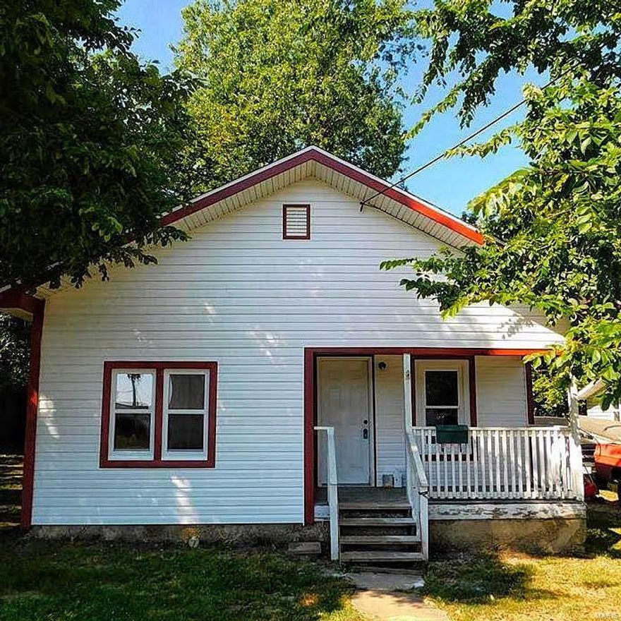 All showings by appointment only.  A minimum 24 hrs notice required for all showings, as property is currently tenant occupied. 
Great investment property!  2 bed, 1 bath in downtown Sullivan, located in a very private setting with large screened back yard and storage shed. Has rented for $580. Nice covered front porch and house has newer siding and trim.  New roof to be completed prior to sale.  Some new windows and flooring.  Property is currently occupied, tenant would like to stay in the property if possible.