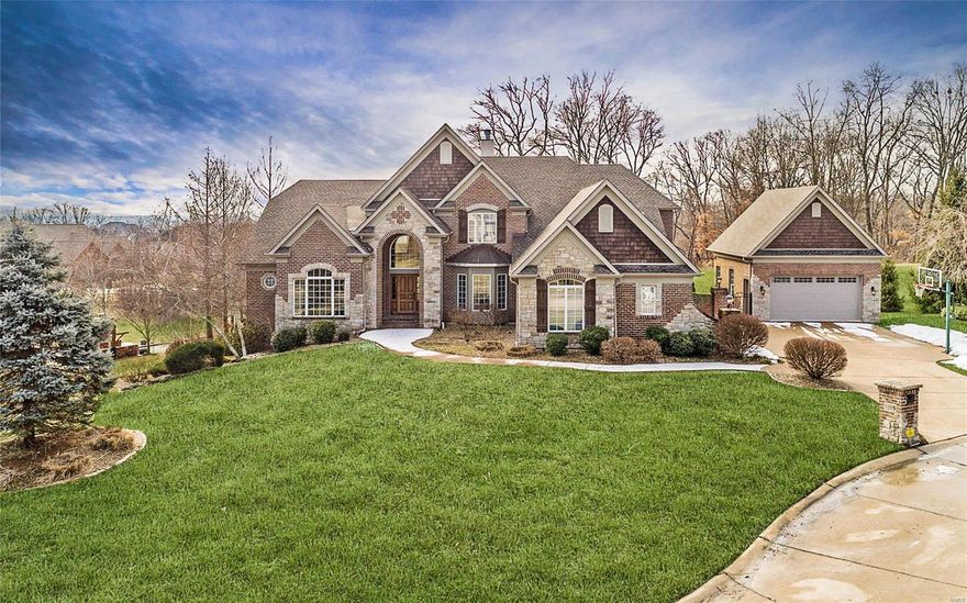 Your dream home awaits! This fabulous custom home is nestled on a private cul de sac offers year round entertaining inside & out. Attention to detail abounds in this 3/4 brick, 5 car masterpiece w/extensive millwork & unique ceilings. Incredible outdoor space w/every upgrade imaginable from the salt water pool & spa to the expansive outdoor kitchen & bar, you will entertain in style. Gather around the free standing fireplace & enjoy the gorgeous view into the common ground at the back of the lot. The chef kitchen boasts Viking refrigerator, 6 burner gas stove, double dishwasher, wine cooler & expansive granite counters. Cuddle up for a movie in the theater room while enjoying cocktails from the gorgeous LL wet bar or enjoy the expansive rec areas & 2 add’l bedrooms. Retire to an amazing master suite w/hydro-therapy tub, heated towel drawer & lush amenities. You will rest secure with the touch pad security system, while enjoying the music system, 3 zone HVAC, ensuite bedrooms & more!