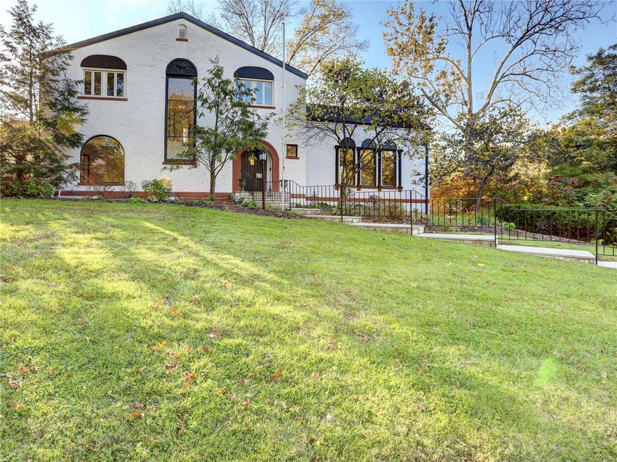 Elegant and stately 1.5 story Spanish Colonial in Sherwood Forest. Completely renovated home provides unmatched architectural detail coupled with beautiful high-end finishes. Great Room offers beamed vaulted ceiling, hardwood floors, arched doorways, and a huge gas fireplace. This gourmet kitchen is built for entertaining featuring a 36 in. gas range, huge quartz island with seating on 3 sides, and a 166 bottle wine fridge.  Original arched French doors open to the main floor master suite featuring a massive marble shower, double sinks and a huge walk-in closet equipped with laundry and a private sunroom with matching arched windows. Upper level offers a 2nd master suite with an ornate Romeo and Juliet balcony, marble bath, and cedar closet. 2 additional large beds served by an updated Jack and Jill bath with laundry. This stunning home encompasses 3/4 acre with lush landscaping and enchanting flower gardens, 2 car garage and additional parking. A short walk to downtown Webster Groves Additional Rooms: Sun Room