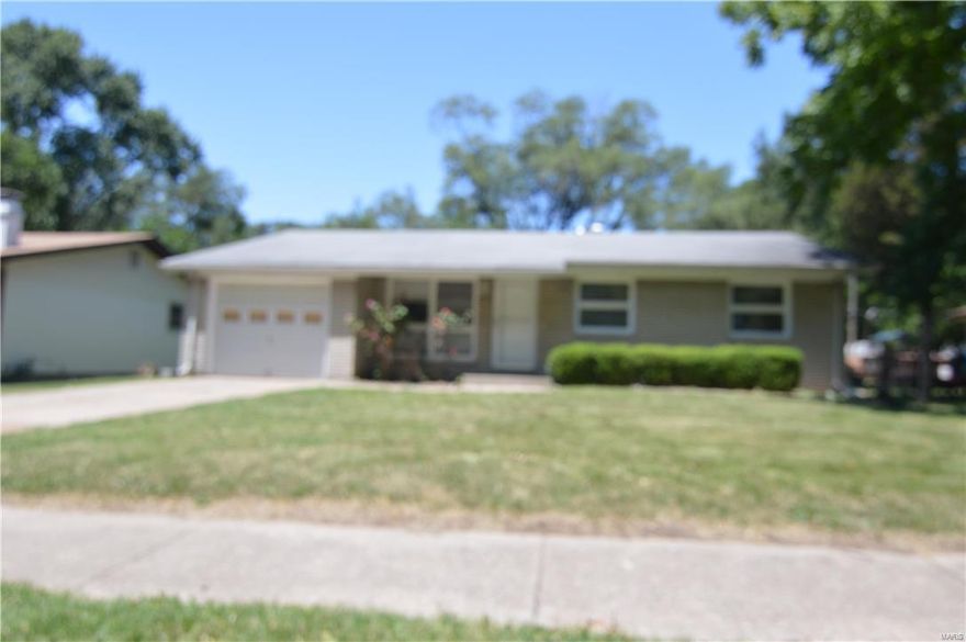 This is a nice 3 bedroom and 1 and half bathrooms.  It has been freshly painted and has nice wood floors.   A sump pump and pit has been placed in the basement.  A nice leveled lot with one car garage . Home Warranty Plan being offered.