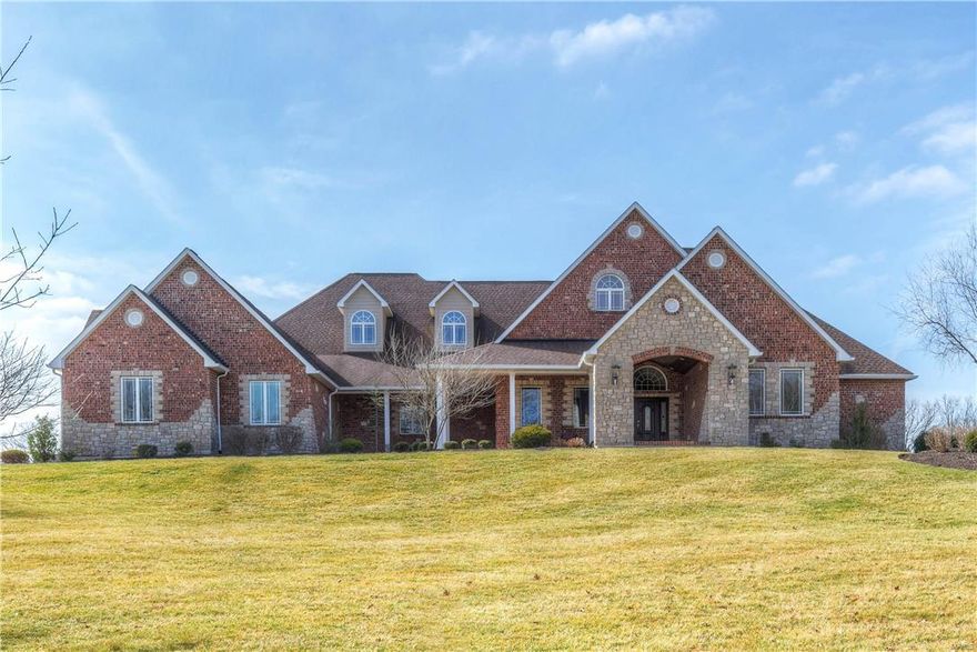 Gorgeous, sprawling ranch on 3.3+/- acres. You are welcomed by the grand, tile flr & vaulted ceiling entry, which is only a fraction of what this home offers. Cstm crown molding thruout that flows beautifully but slightly differs in every rm. Chef's Delight ktchn boasts granite, center island w/ sink, cstm 42"cab, Viking app, Subzero fridge, brkfst bar & all the extras you could imagine.  Off the ktchn is the GR w/ flr-ceilng stone, gas FP. MF master feat coffered ceilings, HUGE cstm closet w/ islnd, dble vanity, Shower w/ steam, rain & body sprays & jet tub. Oversize laundry rm, 2 guest rms each w/ full bath & walkin closets, sunrm w/ vaulted wood ceilng & formal living rm complete the MF. Finished LL feat family rm w/ projector, gas FP, ktchnette & space 4 pool table/office. Workout rm & 4th bdrm w/ full bath & walkin closet tops off the LL. Enjoy the outdoors w/ your level, fenced backyard or sit & relax on one of the many decks/porches. See special features sheet 4 more extras! Additional Rooms: Sun Room