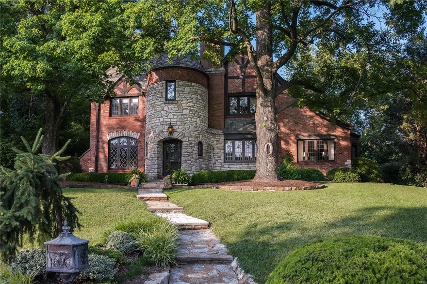 Rare opportunity available, original well-kept residences in La Hacienda. The personal residence of architect Edward Lantz and lovingly cared for and updated by the current owners, this house in a class by itself between the architecture and gardens. Close to St Louis Country Club and walking distance to Clayton it’s a prime Ladue location. Inlaid terrazzo floors, stone and brick construction and a slate roof, make this a palace. Rich wood trim, leaded wheel cut and stained-glass windows and a hand carved Italian mantlepiece set the tone for this timeless masterpiece. Living dining and sitting rooms are exquisite and offer views of front Brazilian granite terrace and lush rear gardens. The kitchen was recently updated with Quartzite countertops, travertine flooring and glass tile backsplash. Appliances by Subzero and Thermador. 4 spacious bedrooms upstairs two are updated ensuites. The garden is pure bliss with waterfall and easy-care plantings. Ladue School District. New Driveway (18) Additional Rooms: Mud Room