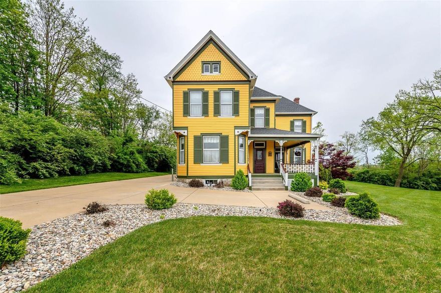 Stupendous historic 2 Story home, 3 bd, 2 ba, level lot, tons of parking in the highly desired area of Manchester, the most attractive living & shopping destination in West County. Entry foyer brings you to the living room where you are drawn to the lovely windows that allow tons of natural sun to flow, a large family room for bonding & entertaining. Gorgeous original pine floors, refinished throughout. Eat-in style kitchen has stylish white cabinetry for all your culinary supplies, attractive lighting & lovely backsplash. The stunning bathroom on the main level has a stunning tiled rain shower w/glass door & vanity. Sleep in tranquility in 3 bds located on UL & large full ba features ceramic tile floor. The laundry area has stackable w/d for convenience. LL has plenty of space for storage & organizing. Inviting covered front wrap porch is perfect for sipping morning/afternoon tea, also a covered rear porch to soak up the sunshine, an oversized parking area & outside storage building.