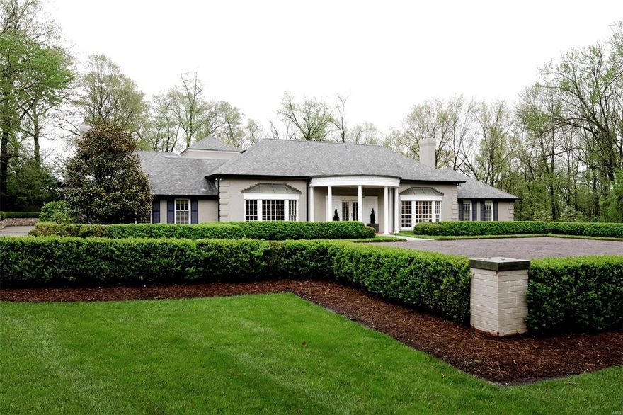 Unique one of a kind architecturally distinctive home built on a beautiful 1.8 ac. private lot in a convenient, walkable central location. Sleek and updated home is light and airy and built around a central garden courtyard. The welcoming front courtyard is just the beginning. Keeping in line with today's lifestyle, this home features a wonderful kitchen opening to a large family room and dining area. Both lead to pretty outdoor spaces. The first floor includes an extraordinary master suite with spa-like bath and generous walk-in closets, a second bedroom (currently being used as an office) and full bath, media room with built-in wine cellar, living and dining rooms, laundry, utility and mud rooms plus two half baths. Three more bedrooms are upstairs along with a second large family room and two full baths.Lower level space is perfect for an exercise room, storage or kid's play area. Attached 3-car garage and beautifully landscaped, level and private yard. A very special home! Additional Rooms: Wine Cellar