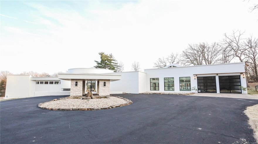 Indulge in luxury with this sprawling ranch, boasting 4 beds + 4.5 baths. 
On nearly 2 acres, overlooking a pond & the 15th hole of OMCC.
The intriguing curb appeal sets the stage for what lies within. Built in 1965, it underwent a redesign inspired by Frank Lloyd Wright's iconic style. A striking ceiling dome greets you, with expansive windows, & a gracefully curved hallway. Slate floors add an interesting touch, along w/ a double sided fireplace, & sunken entertainment room. The kitchen; a chef's dream with 2 islands, quartz countertops, concrete sink, & lux black + champagne appliances. Retreat to the main level master, boasting a fireplace, walk-in closet, tile shower, concrete tub, floating vanity, & your own sauna!
The basement features a rec room with a mini bar, bed, & bath. 
The highlight is the heated pool + hot tub, opening to a vast patio, blending indoor/outdoor living. This home is a masterpiece, a must see for those seeking unparalleled comfort & design!
agent/owned Additional Rooms: Sun Room