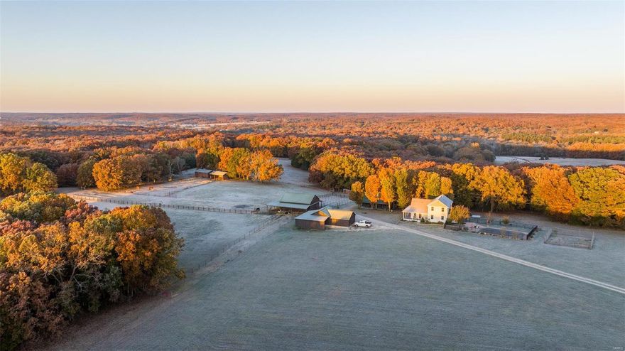 Discover Rustic Elegance on This 71-Acre Rosebud Farm! Nestled in Rosebud, this 71-acre farm caters to nature enthusiasts and equestrians alike, featuring a 40x30 barn with two lean-tos, chicken coops, a tack room, and six roomy 11x10 stalls for the comfort of your horses and livestock. A dedicated wash stall adds convenience. For guests a charming bunkhouse provides a cozy retreat. The main house boasts rustic elegance with beautiful hardwood floors, a tongue and groove ceiling, a gas fireplace and a beautiful remodeled kitchen.  In addition, the property boasts a luxurious inground pool with bathhouse. Amidst the 71 acres with two 40x25 running sheds offer shelter for equipment and livestock. Additionally, there's a stocked pond for those who enjoy fishing and serene water views. This property has endless opportunities for agriculture, livestock or simply enjoying open spaces. With a blend of rustic charm and modern comforts this Rosebud farm fulfills the rural lifestyle you desire.