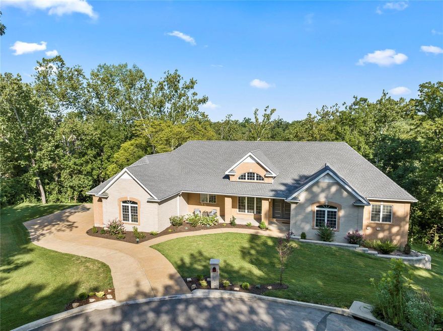 2-year-old atrium ranch in Town & Country....Fresh- Modern - OPEN floor plan. Custom-built by the present owner with hands-on attention to quality & details galore. Expansive West Coast Relaxation & Entertaining Lifestyle. Spectacular PRIVACY surrounds every aspect & 1.17 acres of Forest of Trees perched high above surrounding homesites. The walkout lower Level offers a Full Entertaining style kitchen a wide-open concept of living & 2 more BRs. Windows galore view the deep forest of trees & breathtaking sunsets. Two fireplaces on Main Level w/Engineered Wood Floors throughout. The Master En-Suite has French doors, offering you the opportunity to design a deck or even a Screened Porch later. Cooks Kitchen where everyone gathers around Focal Point Center Island w/seating. Kitchen Aid appliances & Gas Cooktop. Laundry Rm w/ window & cabinetry. Washer & dryer are MAYTAG & convey to buyer. Zoned HVAC. Walk-in pantry w/ convenient barn door. I can't think of anything they missed. Additional Rooms: Mud Room