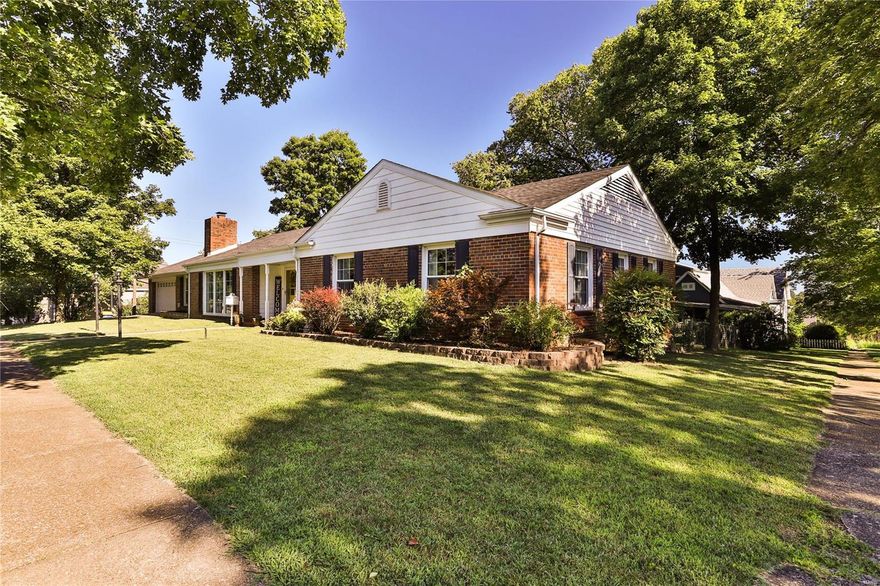 ALL BRICK, 2400 sq.ft., 4 bed, 4 bath home comes with original crown molding and hardwood floors in pristine shape, and sprinkled with original built-in book cases in multiple rooms.  Eat-in kitchen has been completely remodeled with custom cabinetry and quartz countertops.  All 3 main level bathrooms are also completely redone.  GORGEOUS, large bay window in the formal dining room.  Large, finished home office is in the basement, and has the egress to be a potential 5th bedroom, or the perfect space for your students to complete their virtual lessons for school.  The full W/O basement also comes equipped with a 2nd kitchen area and the space for entertaining.  This home rests on the corner of a well maintained, quaint neighborhood. All kitchen appliances on the main level, including refrigerator, are included in the sale of this home.  ALSO INCLUDED, the upgraded washer/dryer set in the basement!  All mounted televisions, with their brackets, and other appliances are negotiable.