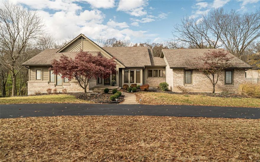 On a PRIME 1+ acre lot in the desirable Sugar Creek Valley you will find this EXCEPTIONAL 5,000+ sf custom home. With spectacular views from every angle, the floor to ceiling windows bring the outdoors in. The gracious foyer welcomes you to view the grand dining room & soaring vaulted great room with fireplace and custom built-ins. Chef’s kitchen w/gorgeous cabinetry, center island & breakfast room will delight you. Luxurious master bdrm suite with spa-like bath, jetted soaking tub, fabulous walk-in shower and his/hers walk-in closets has a private deck access. Two addtl main floor bedrooms, both w/walk in closets share a roomy jack and jill bath. Modern open staircase leads to the AMAZING lower level that offers another full living space w/a spacious family room, private workout area, and an enormous game room~perfect for entertaining! Two large bedrooms and a full bath round out this level. Enjoy the exceptional grounds and multi-tiered decks in this most idyllic setting. A must see! Additional Rooms: Mud Room