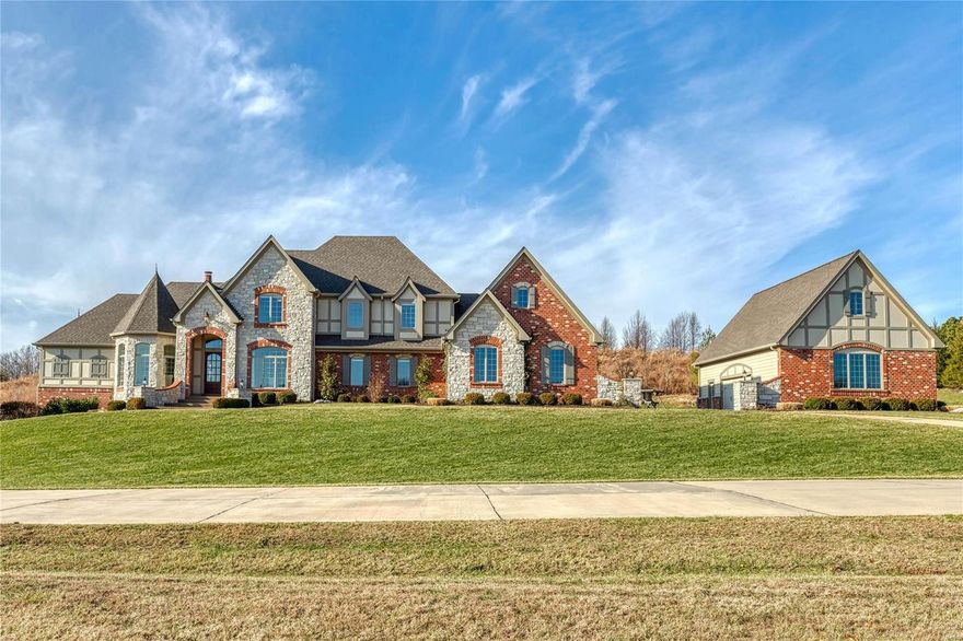 Like new Brick & Stone 1.5 story 7,400 sq ft Estate Home w/garage space for 7 cars. 3 acres in Wardenburg Farms on a street surrounded by multi-million dollar homes. Recently updated kitchen, baths and flooring! Kitchen w/ stacked cabs, Dacor dual fuel range,Bosch dishwasher & Carrera marble tops. White Shaker style cabinets & a 9’ black center island adjoins the brkfst & hearth rm w/ marble FP, beamed cathedral ceiling & bookcases. Sunroom overlooks the saltwater pool, patio & fire pit. Master bed w/ 11’ coffered ceiling, bathroom w/ soaking tub & oversized shower w/ body sprays. Elaborate millwork & job finished oak flooring. 12' ceilings in Foyer, Study & Great Room. Beautiful study. Great Room w/ marble FP w/ lighted bookcases, wall of windows & wet bar w/ beverage cooler. Second Office w/ 2 built in desks. 3 bedrooms suites on 2nd floor w/ 9’ ceilings & private baths and Bonus Room. Walkout LL w/ FP, rec room, wet bar, media room, full bath and office (5th bedroom). Additional Rooms: Sun Room