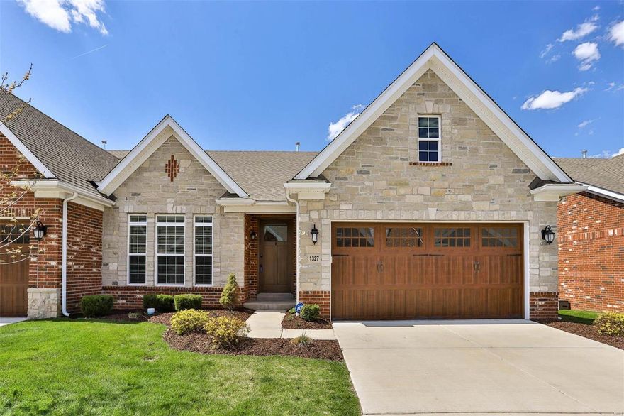 Gorgeous villa in desirable Arbors at Frontenac, move-in perfect condition! Gracious foyer w/ glass french doors to large den/study, amazing open living, dining & kitchen with soaring vaulted ceiling, extensive recessed lighting, fabulous custom kitchen w/ white glass front cabinets, Monogram appliances, double ovens, 5 burner glass induction range, quartz countertops & huge center island breakfast bar. Wide plank hardwood floors, beautiful stone gas fireplace, french doors to private deck, spacious primary suite w/ coffered ceiling, custom closets & luxury ensuite bath w/ double sink quartz vanity, soaking tub & oversized carrara tile shower w/ bench, main floor laundry & mudroom, plus formal powder room. Finished lower level offers so much more living space - family room, game area, home theatre - plus private guest suite w/ full bath. 3,253 sqft of living area, extra storage space, 2 car oversized garage... Carefree living doesn’t get better than this & all in the perfect location!