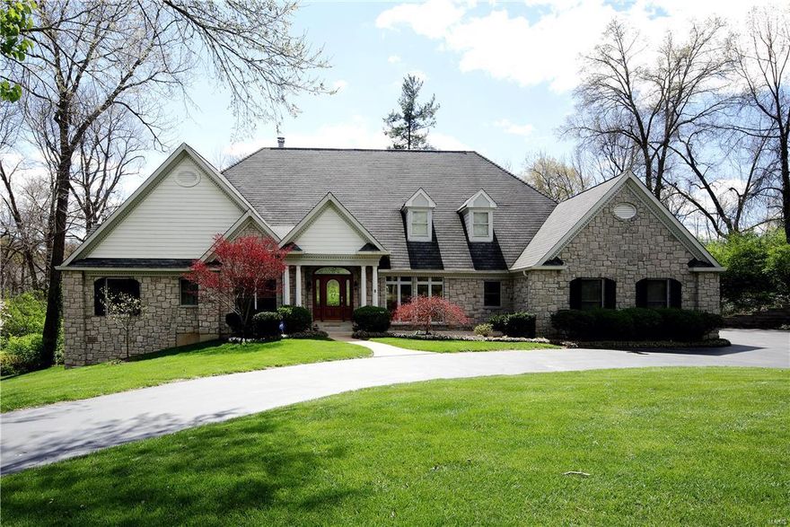Light-filled atrium ranch on private lane in Ladue School district.  15 yr old home offers soaring ceilings, Pella windows, hardwood flooring and open spaces throughout.  The gourmet kitchen with custom cabinetry, granite countertops, hardwood flooring and Viking stainless appliances opens to the family/hearth room with gas fireplace and walkout to deck overlooking backyard.  A dining rm with climate controlled wine rm is perfect for entertaining.  The main floor master suite is complete with 2 walk in closets, gas fireplace, walk out to second deck, and large bath with jetted tub and large glass shower.  2 other bedrms with Jack and Jill bath, mudrm, guest powder and utility half bath are also found on the first level.  The lower level offers a large rec room, 2 bedrms with large windows to the backyard, hall bath and plenty of unfinished space.  A 3 car garage, patio off the lower level and more complete this beautiful property.  This floor plan is typically not found in this area. Additional Rooms: Mud Room