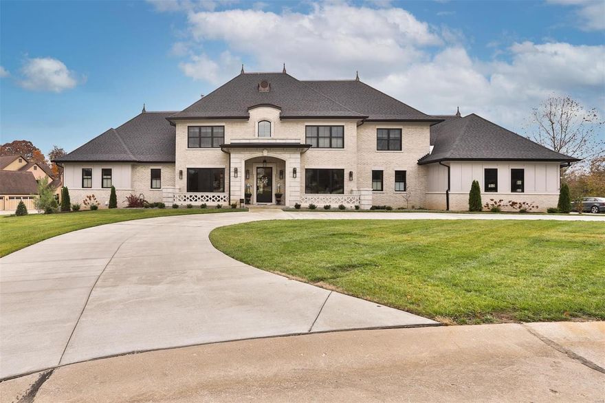 This spectacular Hibbs-built 1.5 Sty exemplifies classic architecture w/ a fresh perspective. Open floor plan features custom built-ins, designer lighting & oak hardwoods that extend throughout the main floor. Impressive entry foyer leads to dining room w/ french doors, study & spacious great room with box-beamed ceiling, marble fireplace & accordion doors that open to outdoor living room with soaring ceilings. Culinary enthusiasts will love the chef’s kitchen with white Shaker cabinetry, quartz countertops, premium appliances & 10’ center island. Spectacular primary bedroom suite with luxury bath with freestanding tub offers a relaxing retreat. The 2nd floor extends the living quarters with 4 additional bedrooms, 2 with ensuite baths & 2 with Jack n’ Jill baths, & second laundry. Extensively finished Lower Level includes rec. room, fitness studio & game room w/ wet bar & guest suite. Situated on a 1-ac cul-de-sac lot w/ covered patio, pool & 3-car garage.