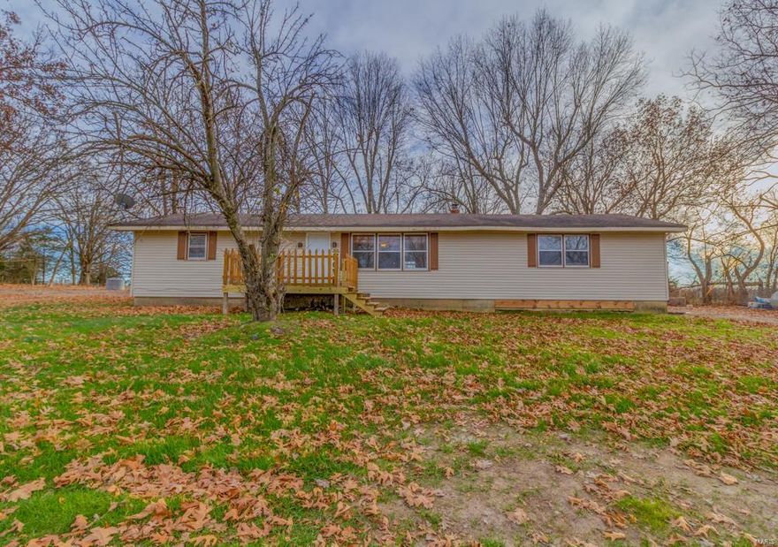 If you have been looking for a 3 bedroom home on a few acres in the JEB School district, this is it! This 3 Bedroom 1.5 bath house sits on a private 2 acre lot and features over 1500 SF, a large living room, nice kitchen, separate dinning room, large walk in pantry, both bathrooms have just been totally remodeled, new carpet in the bedrooms, walk in closets and so much more. The interior was just updated with all new sheet rock and fresh paint.  All new plumbing all the way to the meter.  Many recent updates to this home. Relax on the large back deck and enjoy nature with plenty of wildlife and privacy.  Seller will provide a 1 year home warranty policy for the buyer.  Do not wait to see this one, it will not last long!  Call today to schedule your showing.