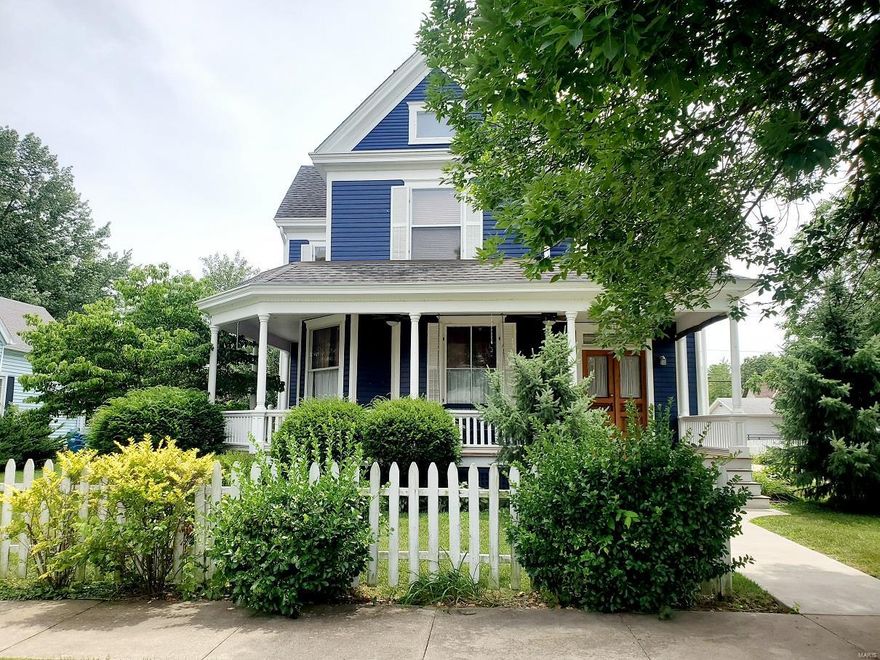 This is a classic!  If you have an appreciation of Victorian architecture, you will love this one.  This home built in 1892 offers extraordinary woodwork, pocket doors, beautiful hardwood floors, large wraparound front porch, transom windows, stained glass, and the list could go on.  There are 4 bedrooms on the 2nd floor with a full bathroom on both levels. The meticulously maintained property also features modern conveniences such as: kitchen with built in appliances (remodeled in 2005),a butler pantry, sunroom (2017), and separate HVAC serving each floor (replaced one furnace and A/C unit in 2015).  The yard is handsomely adorned with a white picket fence & attractively decorated with plants/shrubbery, with nice patio areas to enjoy the outdoors.  The exterior was repainted in 2017-2018, along with tuckpointing work in the basement in 2017-2018. The detached 2-car garage also includes ample space for a workshop.  It is really hard to express the beauty of this one without seeing it! Additional Rooms: Mud Room