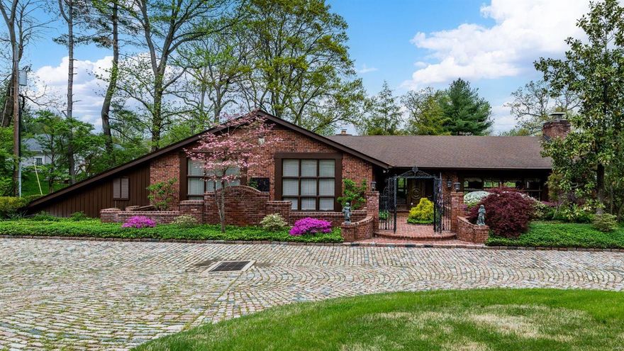 A cobblestone circular driveway leads you to this one-of-a-kind home built with no expense spared by Sidney Salomon who once owned the Blues. Intricate wood carvings in the entry hall came from a ship & a balcony overlooks the 2-story great room. The room features a wall of windows, beamed ceiling with an impressive chandelier, wet bar & a massive fireplace. Off the great room is a dining room with marble floors, beautiful wood moldings, stained glass window & doors that take you to the patio with fountain. The office/trophy room leads to a den featuring ornate doors, a wet bar & vaulted ceiling. Eat-in kitchen with European details. Guest bedroom suite off of the kitchen. The bedroom level has 2 suites with full baths. The main bedroom is exquisite with French detailing, walls of closets, a door that leads to an upper terrace & an extravagant bathroom. The bathroom features a marble tub with swan faucet fixtures & 2 decorative sinks in the marble-topped vanity. 2-car garage.