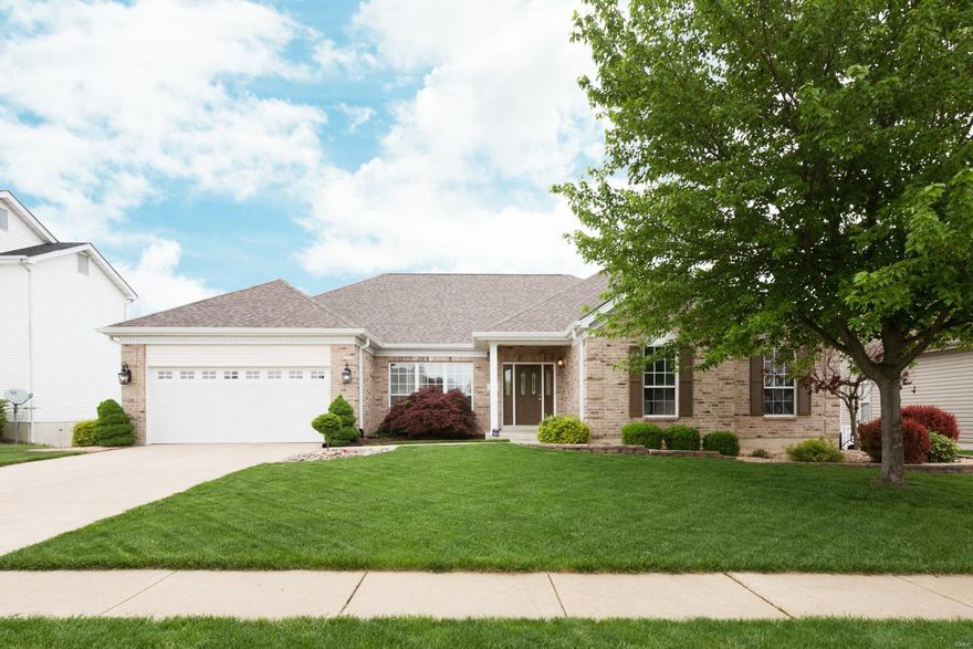 Soaring ceilings & a wall of windows make this spacious atrium ranch so inviting! Recently updated kitchen features custom soft-close 42" cabinets with over & under cabinet lighting, solid surface counters, rich hardwood floors & stainless steel appliances, including a double wall oven. Vaulted ceilings & a brick fireplace adorn the great room with a 2nd fireplace in the family room. Main floor master suite has a trey ceiling, bay window covered by plantation shutters, a walk-in closet & private bath. Tucked in their own wing are 2 family bedrooms & a full bath. Entertain in the gorgeous dining room with a trey ceiling & wainscoting. Light & bright finished lower level rec room with a wet bar, full bathroom & a bedroom with a walk-in closet. Excellent basement storage shelving as well as a workbench in the 7' garage bump-out. Beautifully landscaped yard. All furniture negotiable in the sale. Lovely quiet neighborhood with easy access to shopping & amenities. Immaculate! See it today!