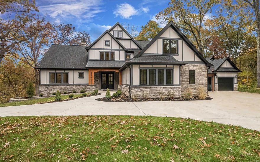 Luxury new construction in Rockwood School District on 3 acres! This 1.5 story 5 bd/5bath custom home offers approx. ~5,800sq ft of luxury. The home features 10' and 14" first fl ceilings, multiple fp, field finished white oak floors, outdoor kitchen, 3 car garage and composite deck. A professional chef's kitchen with custom cabinets, 9ft center island with 3" thick granite and quartz countertops. Top of the line appliances include dual dishwashers, 48" fridge, beverage center, ice maker and 6 burner professional cooktop. The hearth room is the perfect place to sit by the fire and enjoy your view.  The great room has a custom fp & built-in bookcases with 14 ft ceilings. Master suite with coffered celings, sitting room, lux bath with white carrera marble, huge shower and soaking tub. Upstairs has 3 large bedrooms, 2 baths and a 2nd laundry. Finished lower level boasts wet bar, full bath, bedroom and media room. The lot is extremely private and just 5 minutes to the Chesterfield Valley.