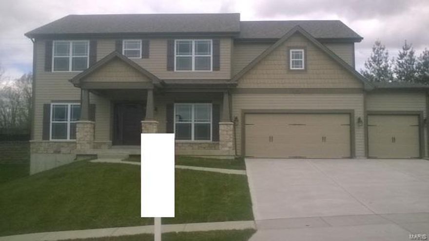 A great value for this striking 3,100 square foot 2-story with Craftsman style elevation and 3-car garage.  The luxury Kitchen offers a 2' bump out with an over sized granite top island with overhang.  There is an abundance of upgraded cabinets with 42" wall cabinets.  Hardwood floors in the Kitchen, Breakfast Room, Great Room and Foyer.  Vent free gas fireplace in the Great Room with window wall.  Spindled railings to the second floor leads to Bonus Room.  Luxury Master Suite is approximately 19' x 21' with luxury Master Bath tub, separate shower and double vanity bowls.  Other amenities included are fully sodded yard, can lights in kitchen, upgraded appliances, programmable thermostats, low-e windows, custom wall color and lower level rough-in bath.