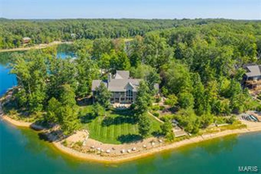 Coastal living is right here in the Midwest in this ultra luxurious Alpine Lake home! As you approach the front door, you'll look right through to the 200+ acre lake that sits just on the other side of the home. Amazing water views await from nearly every room in this beautiful home where you are always on vacation, whether it's your full-time residence or your weekend escape. Entertain in glorious style w/ two living areas one on the main level & one in the walk out lower level. The kitchen is the heart of the home and this one is no exception. However, you'll be hard-pressed to sit around the island when the entertainer's dream screened porch beckons from steps away. Enjoy your morning coffee, a late night board game with family or a cocktail party to the wee hours in this wonderful space or year-round in one of the many welcoming spaces of this light-filled splendor of this exclusive residence on Innsbrook Resort's premier lake. Be sure to watch the video to experience the grandeur!