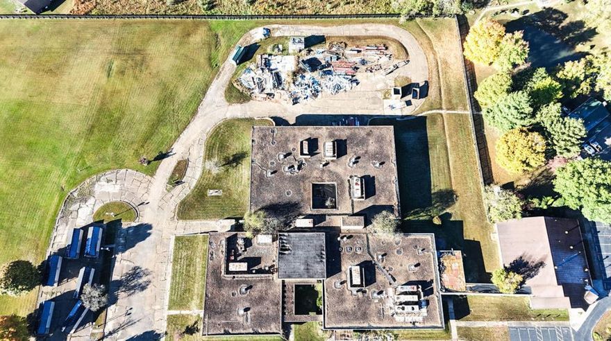 Great Investment Opportunity sitting on 6.8 acres m/l with an open canvas to do want you want with. Located perfectly off the highway with easy access to the grounds and a lot of good undeveloped land as well to build with tons of parking. Location: High Traffic, Hwy/Interstate Frntg