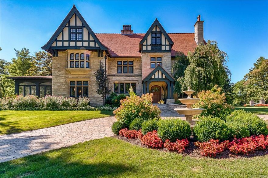 This spectacular Tudor Revival home nestled in the peaceful Webster Park Neighborhood has been meticulously maintained to preserve its historic beauty. Featured on the cover of St. Louis At Home Magazine as one of, "The 10 Most Beautiful Homes In St. Louis." The old world charm intermingles with today's modern conveniences including an immense smart home technology package throughout the home creates a comfortable & stylish lifestyle. Upon entering the grand foyer you will be graced with the impeccable original craft millwork. The main level of this 3 story home features multiple expansive living spaces, gracious formal dining room, & bright updated kitchen. Second & third floors boast 6 individually unique bedrooms & lavishly finished bathrooms. Lush landscaping creates an enchanted setting for the in-ground pool, hot tub, and tennis court. Tranquil & resort like grounds provide an unparalleled atmosphere for outdoor entertaining. Seven car garage w/heated floors & central a/c. Additional Rooms: Mud Room, Sun Room