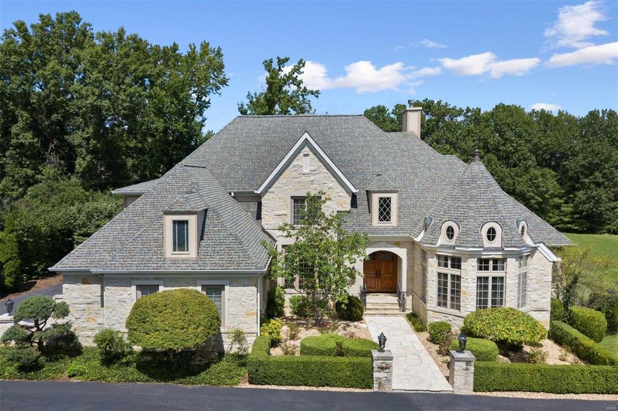Exceptional Country French stone home situated on a gorgeous 1.28-acre lot with dreamy pool and pool house is available now. Unsurpassed workmanship is evident throughout with exquisite moldings & built-ins throughout. Unique fireplace mantles set the tome for three living spaces including the Master Suite, Heath Room, and Living Room. Entertain with ease in cooks kitchen/ hearth room overlooking flagstone patio, pool and pool house. First floor features large gorgeous study as well as sitting room/ofice off Master Suite. You will have plenty of room to spread out in this luxurious home. Upstairs there are 3 large bedroom plus a loft/5th bedroom as well as three full baths(two suites)  Almost 1900 additional sq. feet in lower level with media room, exercise room, family room with beautiful wood bar as well as other flexible spaces. This wonderful home in the Ladue School District could be the one! A sign will not be placed in the front yard.