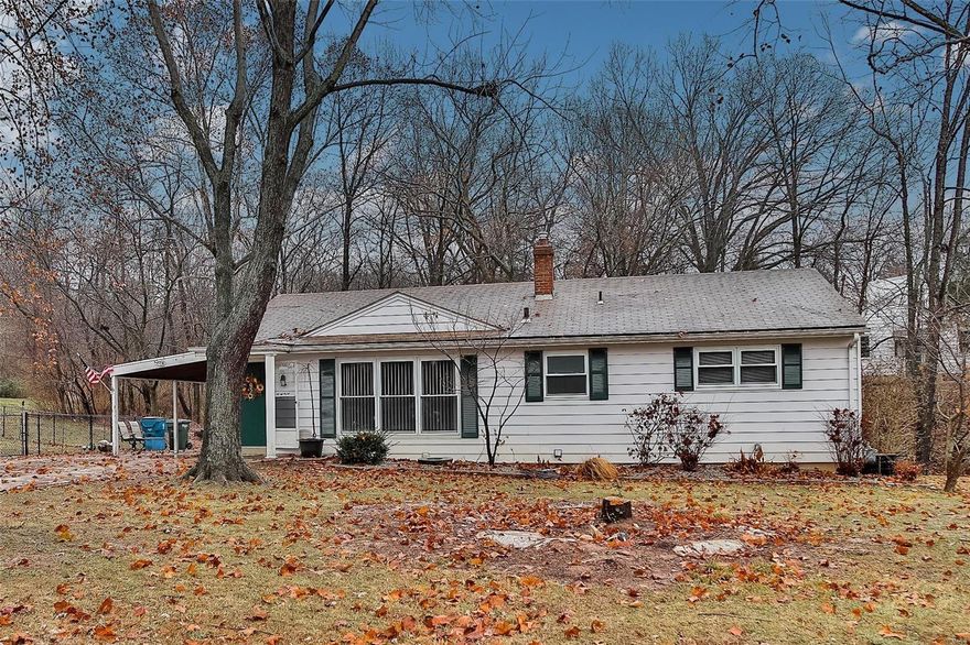 Wow! 4 Bedroom Ranch on almost a half acre in Oakville Schools!  This cute home has a generous sized living room that is bright and sunny with wood flooring.  Eat-in kitchen is complete with 42" cabinetry, pendant lighting, ceiling fan, and trendy backsplash.  There are three bedrooms on the main level, with the master having two closets, all having wood flooring.  The 4th bedroom is in the walk-out lower level, along with a full bathroom.  Some newer updates are the huge, expanded driveway, newer electric service panel, newer hot water heater, and newer roof over the carport.  There is also a great fire pit area in the back yard and fenced area in the side yard.  This home is a MUST SEE!