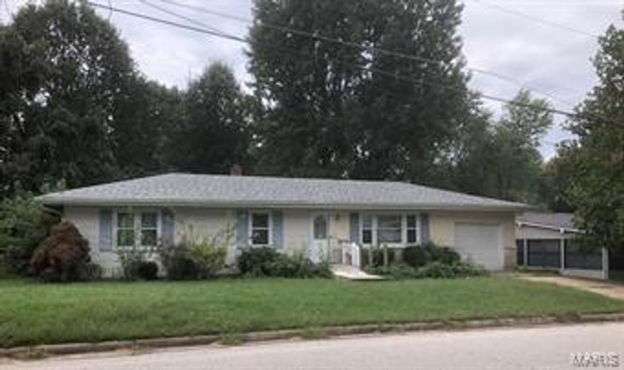 A little TLC and this home could be yours!  This 3 bedroom home with a large kitchen has so much potential.  Hardwood flooring, main floor laundry, workshop area, sun porch, back yard privacy and off street parking.  The basement offers a retreat to a man cave or family rec room.  And there's plenty of storage too.  With a little hard work, you could make this a wonderful home.  This home is being so "as is" with no improvements to be made by seller. Additional Rooms: Sun Room