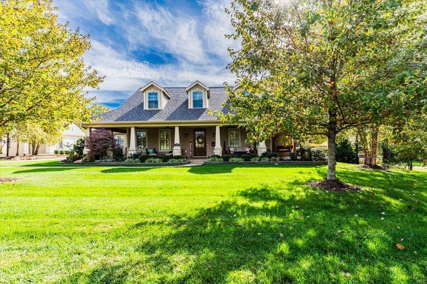 Custom built home exudes the charm of a luxury fairy-tale cottage. Prepare to be captivated by exquisite design, nestled on 1/2 acre of picturesque land. Main level features primary suite complete w/ huge custom walk-in closet, spa-like bath featuring soaking tub & rejuvenating rain shower. Hearth room, adorned w/ stately fireplace and wet bar, opens to an inviting covered patio... stone wood-burning fireplace creates perfect setting to unwind, enjoy a cozy fire or watch the big game on the outdoor TV. Culinary aspirations flourish in the kitchen, a chef's paradise boasting a spacious center island, dual ovens, microwave/convection oven, premier appliances including an induction cooktop & custom pantry. Mudroom leads to oversized 3car garage, laundry & powder rooms. Private staircase ascends to a 700 sq ft living quarter—perfect teen suite, media room, or 5th BR. 2nd level features 3 additional beds and baths. Unfinished LL provides future finishes w/ egress & rough-in plumbing. Additional Rooms: Mud Room