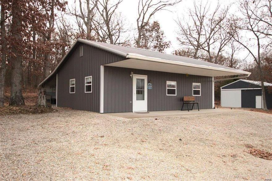 Beautiful income producing 120 acre farm. (Parcel in total is: 220 acre farm in Macon County Approximately 114 acres tillable, 25 acres pasture and 81 wooded acres - Marketable mature timber). Rustic shouse works as a great weekend place or hunting cabin has wood stove for heat and window air conditioner.  Open floor plan with Kitchen setup, it has a county water spigot @ corner of building with a larger covered front porch overlooking most of the property. Adjacent metal barn w/ concrete floor with opposing 12' tall sliding doors for easy equipment storage. Excellent deer, turkey and quail hunting. Stocked pond and Ten Mile creek runs through property for year round water sources.  This is a great mixture use property just call your families name. Tax ID: 000011-0623-00000-00 reflects 220-acre parcel.