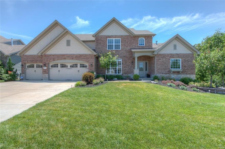 This former display screams luxury and sophistication everywhere you look.  Kitchen is a cook's dream with 42"custom cabinetry with crown, wood flooring, quartz counter-tops, granite island and double wall ovens.  Oversize family room has 10'ceilings and two sided gas fireplace with stone surround.  Master suite is a spa oasis with enormous bedroom with tray ceiling, his/hers closets, adult height dual vanities and tile shower and tub surround. Upper level has 3 huge bedrooms each with their own private bath which includes a jack/jill with shared shower.  Large loft area is raised and adds a unique feature with arched openings and iron railings that keep the staircase open to main level.  Walkout lower level is finished with rec-room and media room with raised floor ready for theatre seating.  Enjoy the outside on the other side of the fireplace under the spacious covered deck overlooking the tree-lined backyard.  Too many features to list!!!  You have to come see it before its gone!!!