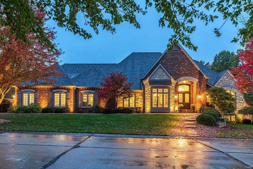 Spectacular European-inspired ranch home in prestigious Windcastle. Impressive hardwood foyer leads to paneled study with built-in bookcases, elegant dining room with octagonal ceiling and stunning great room with 15’ box beam ceiling & limestone fireplace flanked by full-height windows. Designer kitchen with granite countertops, glazed cabinetry, premium appliances & convenient planning center adjoins light-filled breakfast room with wide bay window & vaulted hearth room with beam trusses & floor-to-ceiling stone fireplace. Coffered master bedroom suite with beautifully appointed bath with jetted tub & shower spa offers an appealing retreat. 2 Additional bedrooms with Jack n’ Jill bath complete the main floor living quarters. Lower Level entertainment space includes recreation room with wet bar, game room, media room, 4th bedroom & full bath. Outdoor living area features stamped concrete patio with gazebo & grilling station, free form pool & hot tub surrounded by landscaped gardens.