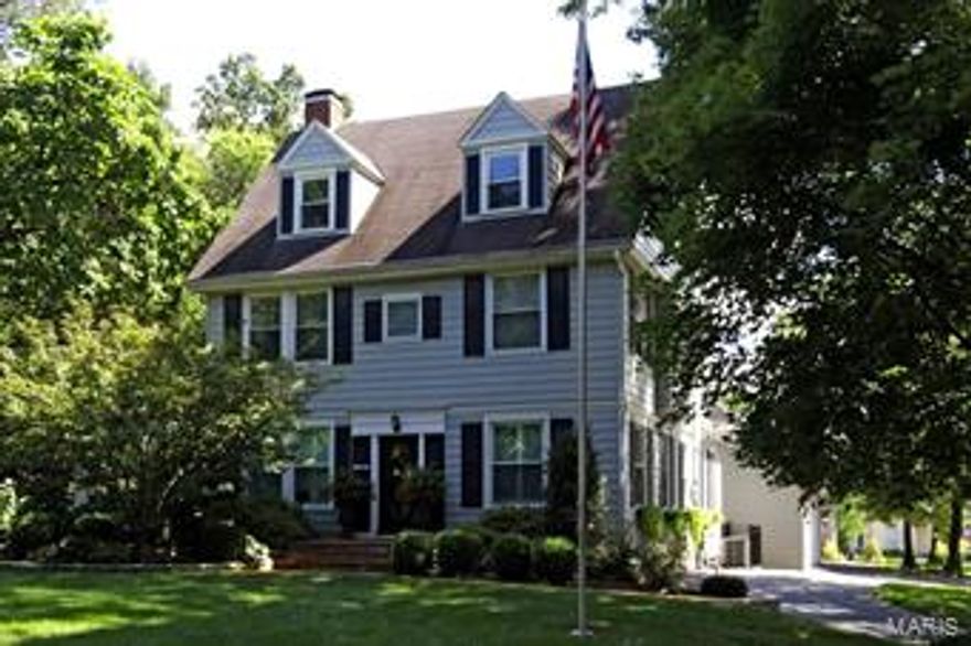 Exceptional floor plan, architectural details and lots of beautiful greenery out every window. Hardwood floors and detailed crown molding surround the foyer, dining room, kitchen and family room. While standing in the dining room, your view gives you the visibility through the kitchen and into the family room which ties the first floor together very nicely. This home is designed for the ultimate entertainers - the luxurious backyard has an hourglass pool, patios and a private screened porch - offering limitless style.  Natural light shines throughout the updated, gourmet eat-in kitchen which includes stainless steel appliances and custom cabinets.  Four fireplaces, tall ceilings, three-car garage and much more!  Walking distance to downtown Kirkwood where you can find numerous restaurants, the Kirkwood Farmer's Market and Tropical Moose - a neighborhood favorite!  This home won't last long!