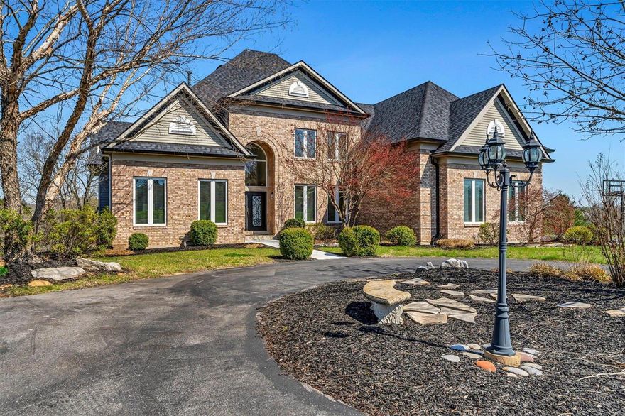 This Stunning Brick Home, nestled on a 3-acre lot, has Custom Updates throughout. Step into the inviting entryway to discover a Great rm w/ a wall of windows & floor-to-ceiling see-through fireplace (mirrored in the LL). Kitchen features granite counters, stylish backsplash, large center island w/ a stunning waterfall edge, & stainless appliances. The main level primary bdrm suite offers luxury w/ 12' tray ceiling, corridor to a den, en-suite full bath w/ separate tub & shower, & two vanities. Two walk-in closets w/ closet systems & main level laundry room add convenience. Upstairs, Jack-&-Jill bath connects two bdrms, while another bdrm has an en-suite full bath. The lower level is perfect for entertainment, featuring a rec/family area, pool table, wet bar, bedroom w/ full bath, theater room, & abundant storage space. Step outside to enjoy the inground pool & spacious yard w/volleyball pit, perfect for outdoor enjoyment. So Many Updates; please refer to the update/feature sheet.