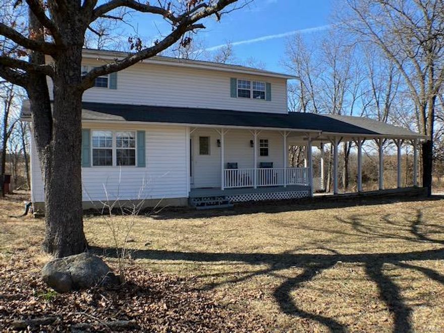 Beautiful and charming 2-story home, close to I-44 for quick access but private and nestled back off the road. This 3B/2.5B home is comfortable and spacious and a haven from the busy work and daily hustle. The kitchen is bright and sunny with white cabinets, wood flooring and a half bath just off to the side. A nice 9x9 utility room sits off the kitchen entry. Adjacent to the kitchen is a very useful dining area with built ins surrounding the picture window at the end. The deck offers opportunity to sit and enjoy the peaceful quality of the property and grill. A large living room completes the main floor. Upper level has two full baths and three extra large bedrooms. The lower level has a family room and full bath. There's lot of storage and double doors to the outside. This home is isolated and yet easy to access services when needed. Also very energy efficient. Call me for details.