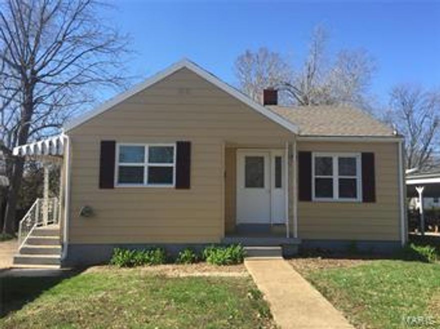 Move right in!  So,so cute... 2 bedrooms, 1 bath, unfinished basement, living room and large (15x33) family room with fireplace, bedrooms and family room have original hardwood flooring, kitchen is open with nice cabinets, kitchen has new floating vinyl that looks like wood, new doors, new windows, freshly painted throughout, ceiling fans, mini blinds throughout, brand new heating/cooling unit, hot water heater and heating system hooked up to natural gas, steel siding, fencing on three sides (could be easily enclosed), lots of storage, covered porch and patio, 9x17 shed with concrete flooring, carport, concrete pad for 4 vehicles, this home will go government financing and has passed city inspection already, close to shopping, schools and I-44.  Hurry... for your showing!
