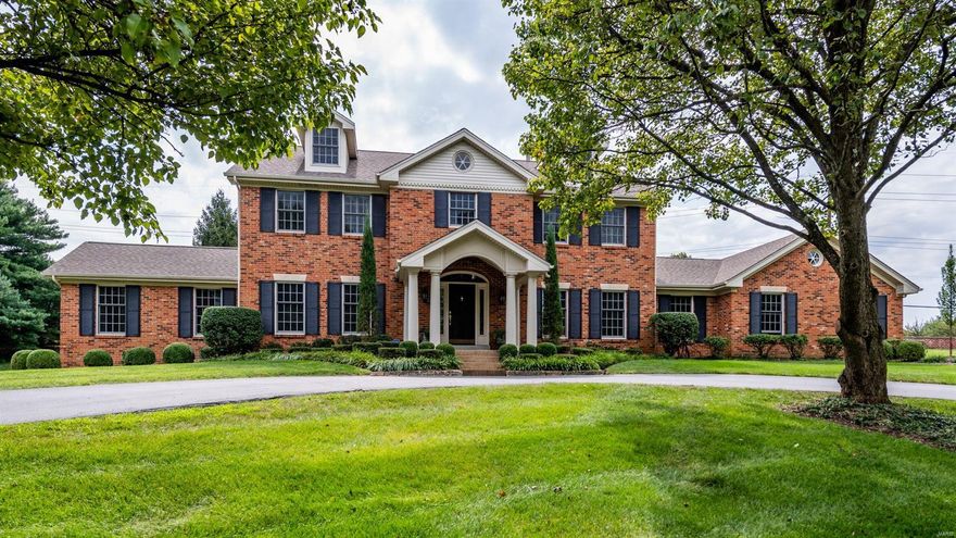 This sophisticated all brick 2-story home in the heart of Town & Country's enclave of Strathmore is truly special.  Enter the 2-story foyer w/ beautiful crown molding, large dining room & living room w/ hand carved fireplace & leaded doors, stately great room opens to a large study w/ beautiful built-ins.  Kitchen is cooks dream w/ high end appliances, pull out cooling/warming draws in center island, custom cabinetry, & french doors lead to the terraced patio w/ built in bbq for al fresco dining, & english gardens to enjoy summer nights.  The well-appointed butler’s pantry w/ wine fridge, customized layout, and magazine worthy laundry room complete first floor.  Large primary suite w/ crisp white bath, steam shower, & jetted tub.  Three generous bedrooms, and full bath round out second floor. Lower level has custom bar, full kitchen, inlaid floor, billiard’s area, rec room, workout room, oversized office, tons of storage & walk out. Magnificent grounds, three-car garage. Perfection!